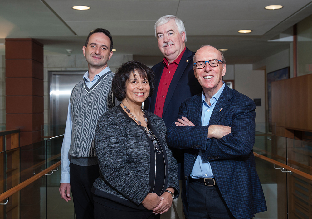 Smith Research Chairs, from left, Yuri Levin, Tina Dacin and Steve Salterio with benefactor Stephen J.R. Smith. 